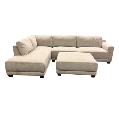 Couch Quest light beige modular sectional sofa with matching ottoman and plush cushions on a white background